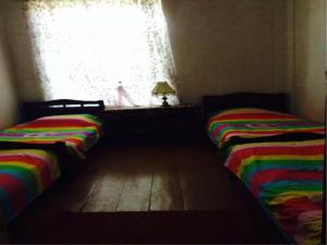 Voodi või voodid majutusasutuse Tamar Guest House toas