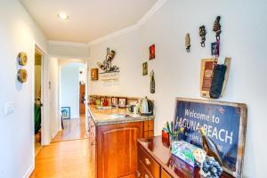 a kitchen with white walls and a counter top at Belle View Laguna Beach Getaway with Patio in Laguna Beach +21 photos