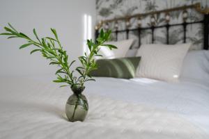 A bed or beds in a room at Casa Tarrío con Piscina - Santiago de Compostela
