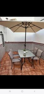 Patio lub wspólna przestrzeń na świeżym powietrzu w obiekcie La encantá