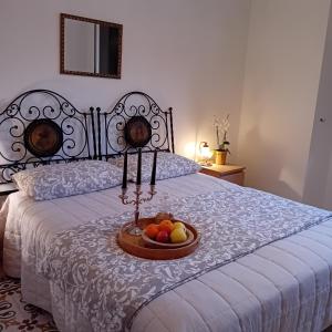 A bed or beds in a room at Happy Holiday