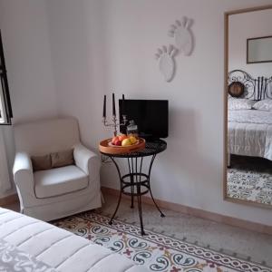 A television and/or entertainment centre at Happy Holiday