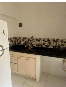 A cozinha ou cozinha compacta de Apartamento Edifício Quitandinha