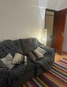 Ein Bett oder Betten in einem Zimmer der Unterkunft Apartamento Edifício Quitandinha