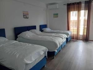 Säng eller sängar i ett rum på Nastovi apartments rooms
