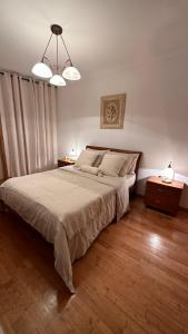 En eller flere senge i et værelse på Appartement tout confort à valpaços