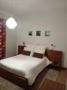 Ένα ή περισσότερα κρεβάτια σε δωμάτιο στο Residencial Morgado +37 φωτογραφίες