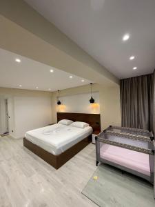 Voodi või voodid majutusasutuse HOME 12 toas