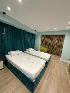 Voodi või voodid majutusasutuse HOME 12 toas