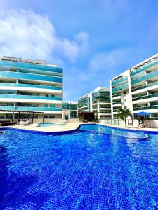 Πισίνα στο ή κοντά στο Apartamento até 10 pessoas Praia Grande - Le Bon Vivant - Vista Mar