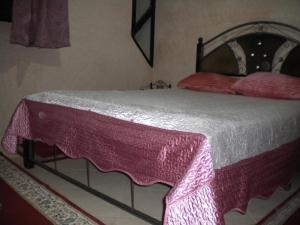 Кровать или кровати в номере Appartement MARRAKECH