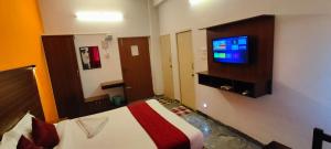 TV a/nebo společenská místnost v ubytování Hotel New Cresent park