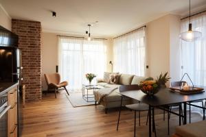 Et tv og/eller underholdning på Binnendiek Haus 1 Comfort-Apartment 5