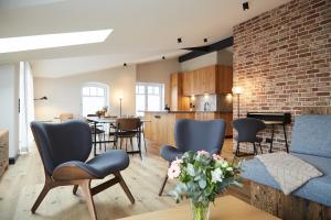 Et opholdsområde på Binnendiek Haus 1 Deluxe-Apartment 9