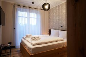 Giường trong phòng chung tại Binnendiek Haus 2 Comfort-Apartment 5 +20 ảnh