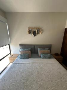 Postel nebo postele na pokoji v ubytování Departamento en Bucerías vista al mar