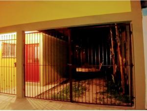 a cage with a gate in a house at MyM Departamentos in Matamoros