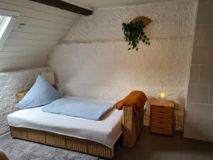 Llit o llits en una habitació de Ferienhaus am Fährkopf