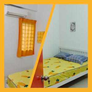 Una cama o camas en una habitación de Homestay Lumut Perak