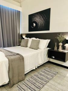 Säng eller sängar i ett rum på Moderno Flat Tolive One
