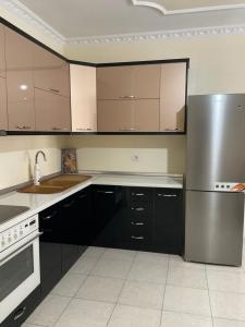 Η κουζίνα ή μικρή κουζίνα στο Entony apartament +4 φωτογραφίες