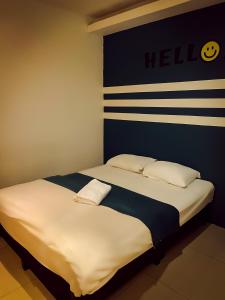 Postel nebo postele na pokoji v ubytování V Hotel Sri Gombak (Previously MyHome Hotel)