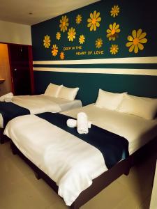 Postel nebo postele na pokoji v ubytování V Hotel Sri Gombak (Previously MyHome Hotel)
