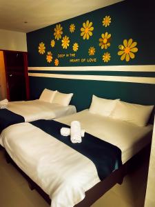 Postel nebo postele na pokoji v ubytování V Hotel Sri Gombak (Previously MyHome Hotel)