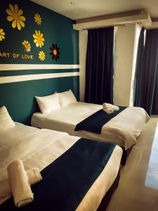 Postel nebo postele na pokoji v ubytování V Hotel Sri Gombak (Previously MyHome Hotel)