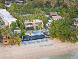 an aerial view of a resort on the beach at Explorar Koh Phangan - Adults Only Resort and Spa in Haad Rin