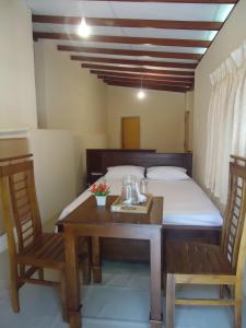 Postel nebo postele na pokoji v ubytování Guest House