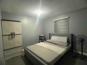 Vuode tai vuoteita majoituspaikassa 2 Bedroom House in Camella Carcar Cebu