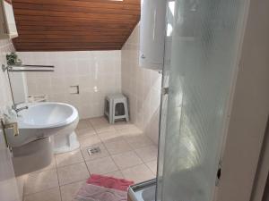 Koupelna v ubytování Napsugar Nyaraló + 37 fotografií