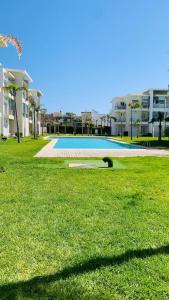 Bazén v ubytování Residence Casa Bay Sidi Rahal nebo v jeho okolí