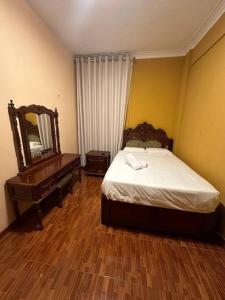 Un ou plusieurs lits dans un hébergement de l'établissement Lima ciudad de los reyes