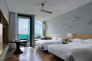 Rayong Marriott Resort & Spa客房内的一张或多张床位