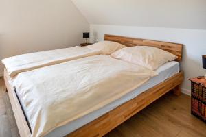 Postel nebo postele na pokoji v ubytování Ferienwohnung Kühn