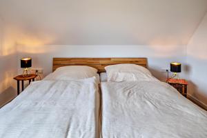 Postel nebo postele na pokoji v ubytování Ferienwohnung Kühn