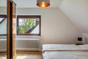 Postel nebo postele na pokoji v ubytování Ferienwohnung Kühn
