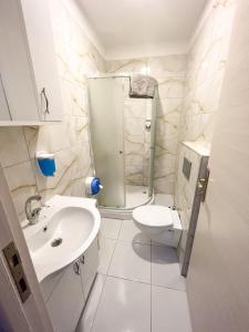 Koupelna v ubytování Mercan Otel