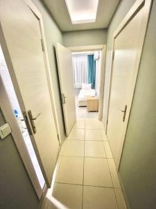Postel nebo postele na pokoji v ubytování Mercan Otel