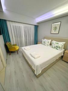 Postel nebo postele na pokoji v ubytování Mercan Otel