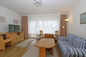 TV a/nebo společenská místnost v ubytování Appartement-Puschmann + 7 fotografií