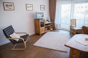 TV a/nebo společenská místnost v ubytování Appartement-Puschmann