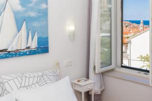 Posteľ alebo postele v izbe v ubytovaní Studio Apartment NIKO II 5 min to center