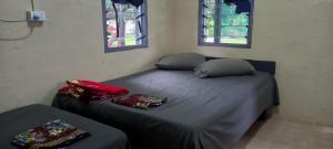 Postel nebo postele na pokoji v ubytování Outback Retreat/Hotel, Ba Fiji