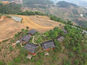 an aerial view of a village on a hill at See bungalow in Mù Cang Chải