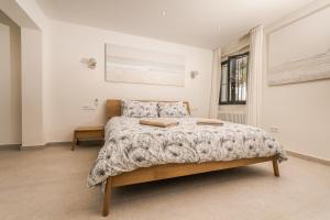 a bedroom with a large bed in a room at Casa Buena Vista in Teulada +42 photos