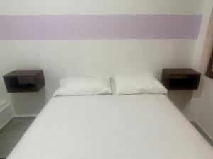 Postel nebo postele na pokoji v ubytování Hotel ZT