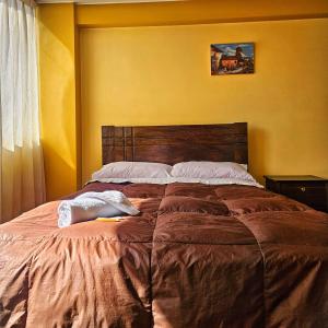 Postelja oz. postelje v sobi nastanitve Pachamama Hostel